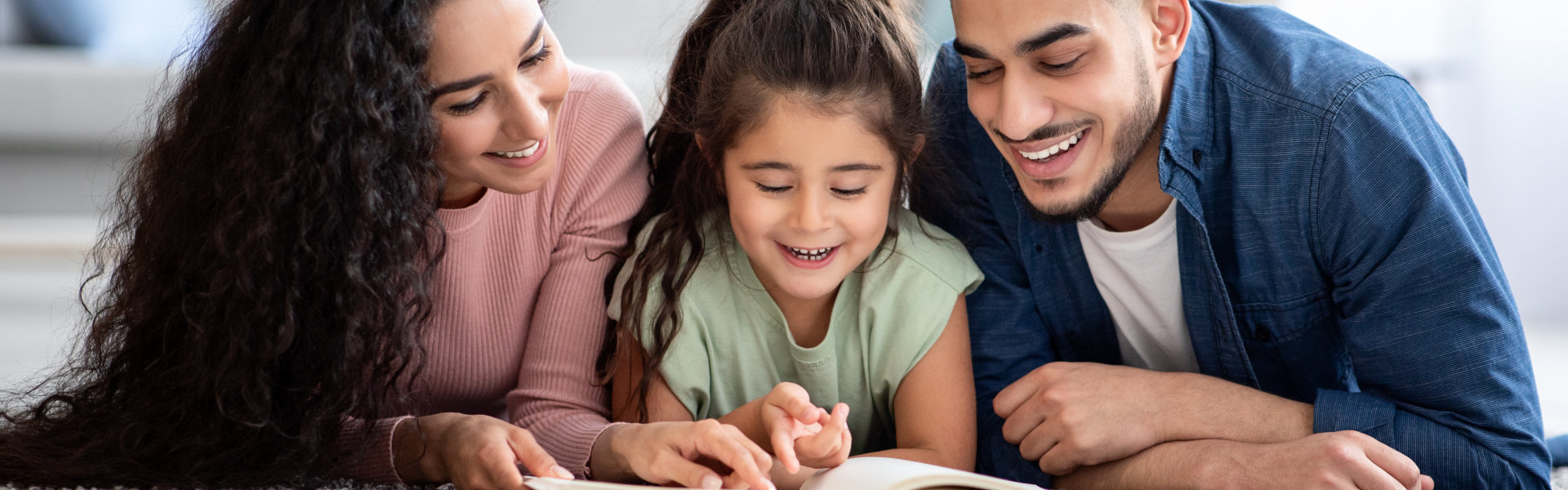 Family Of Three Reading Book